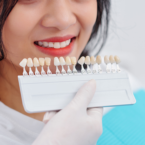 Person choosing dental shades