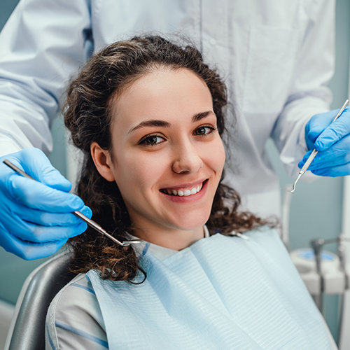 Woman smiling during dental checkup